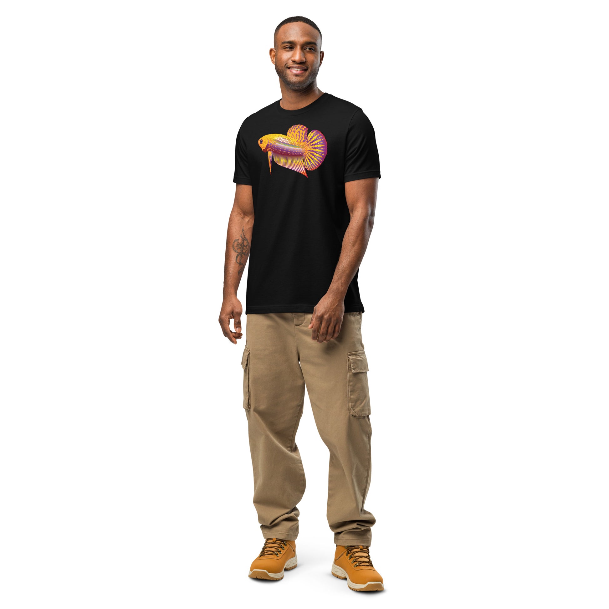 Man shown wearing a Gold Betta Jai print on a black t-shirt from the front.