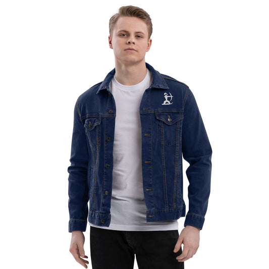 Model wearing House Ullr Unisex Denim Jacket from the front in blue Denim with arms away from the body.